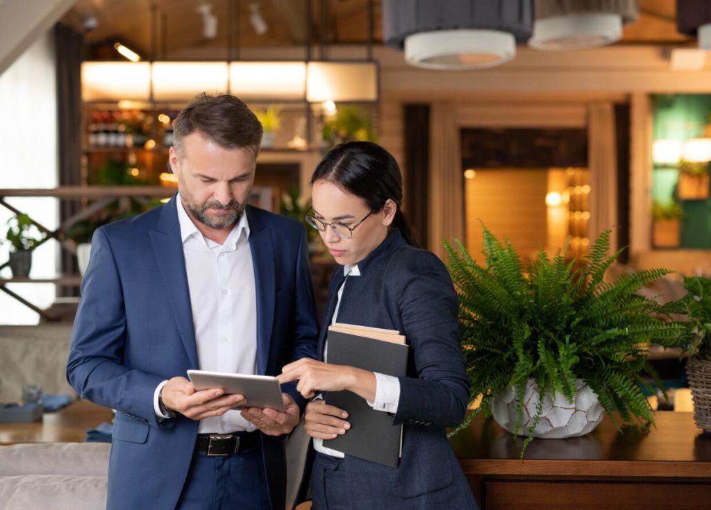 2 corporate workers discussing something