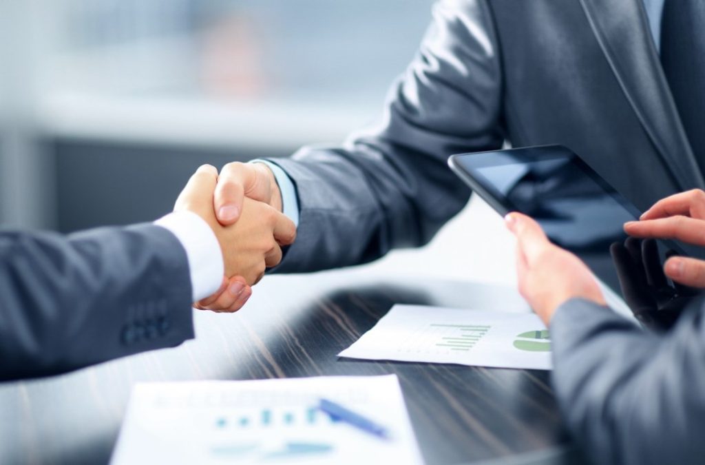 zoomed view of 2 people shaking hands